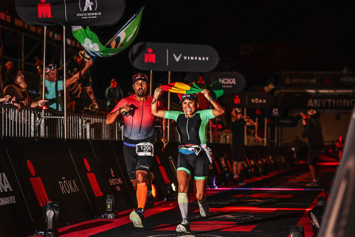 Andy Stainfield and Rose Pantoja finishing an Ironman event