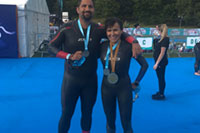Andy Stainfield and Rose Pantoja at Swim Serpentine with London Classics Medals
