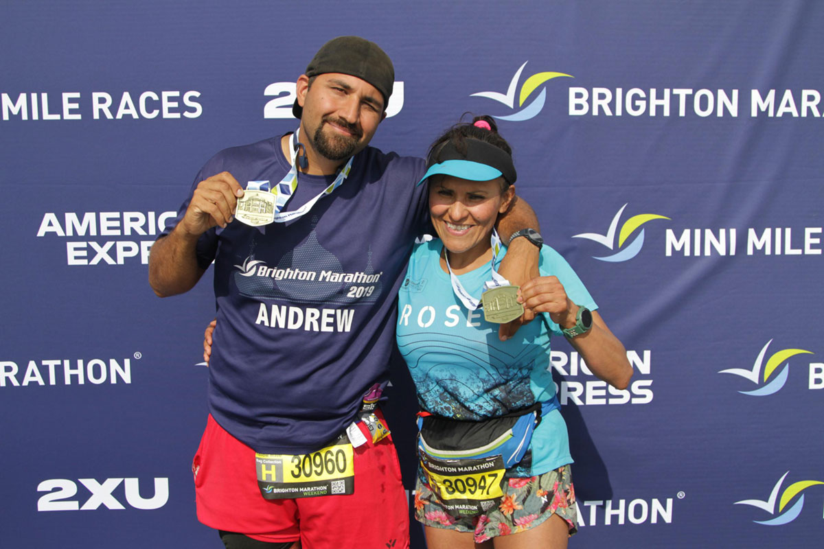 Andy Stainfield and Rose Pantoja with medals at Brighton marathon